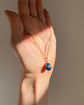 EARLY 20TH CENTURY ENAMEL & DIAMOND EGG PENDANT