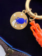 18CT GOLD DISC PENDANT WITH ENAMEL URN