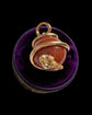 VICTORIAN 15CT GOLD COILED SNAKE & GOLDSTONE SPHERE PENDANT