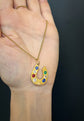 VICTORIAN 18CT GOLD & MULTICOLOUR PASTE HORSESHOE PENDANT