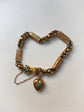 GEORGIAN 15CT GOLD BRACELET WITH A GEM SET HAND, SNAKE & HEART CLASP