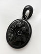 LARGE WHITBY JET ‘TULIP’ LOCKET