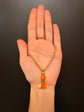 19TH CENTURY CORAL HAND PENDANT