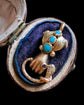GEORGIAN HIGH CARAT GOLD HAND WITH SNAKE PENDANT