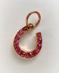 ANTIQUE NATURAL RUBY & 18CT GOLD HORSESHOE PENDANT