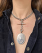 LARGE SCALE VICTORIAN SILVER ‘GARTER MOTIF’ LOCKET