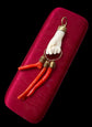 19TH CENTURY CORAL HAND WITH AMULETS