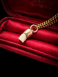 19TH CENTURY MILK TOOTH PENDANT