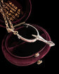 ANTIQUE PLATINUM SPUR PENDANT