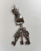 VINTAGE SILVER HAND & KEYS PENDANT