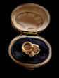 GEORGIAN HIGH CARAT GOLD HAND WITH SNAKE PENDANT