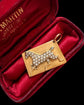 ANTIQUE PEARL & 15CT GOLD HORSE TOKEN PENDANT