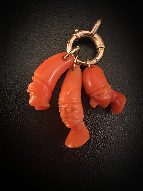 EARLY 19TH CENTURY PUNCHINELLO CORAL PENDANTS WITH LARGE BOLT RING BAIL