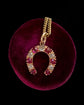 ANTIQUE DIAMOND & RUBY HORSESHOE PENDANT