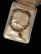 GEORGIAN 15CT GOLD BRACELET WITH A GEM SET HAND, SNAKE & HEART CLASP