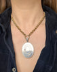 LARGE SCALE VICTORIAN SILVER ‘GARTER MOTIF’ LOCKET