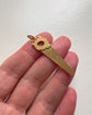VINTAGE 18CT GOLD SAW PENDANT