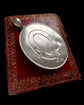 LARGE SCALE VICTORIAN SILVER ‘GARTER MOTIF’ LOCKET