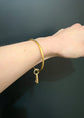 ANTIQUE 15CT GOLD BRAMAH KEY BANGLE