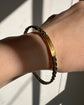 ANTIQUE PLAITED ELEPHANT HAIR & 9CT GOLD BANGLE