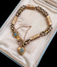 GEORGIAN 15CT GOLD BRACELET WITH A GEM SET HAND, SNAKE & HEART CLASP
