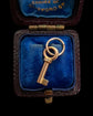 ANTIQUE MINIATURE GOLD KEY PENDANT