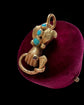 GEORGIAN HIGH CARAT GOLD HAND WITH SNAKE PENDANT