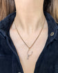 ANTIQUE PLATINUM SPUR PENDANT