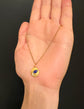 18CT GOLD DISC PENDANT WITH ENAMEL URN