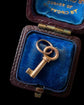 ANTIQUE MINIATURE GOLD KEY PENDANT