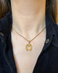 19TH CENTURY HORSESHOE & STIRRUP 18CT GOLD PENDANT