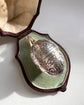 ANTIQUE SILVER EGG PENDANT