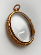 VICTORIAN ORNATE GOLD FRAMED GLASS LOCKET
