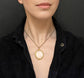 VICTORIAN ORNATE GOLD FRAMED GLASS LOCKET