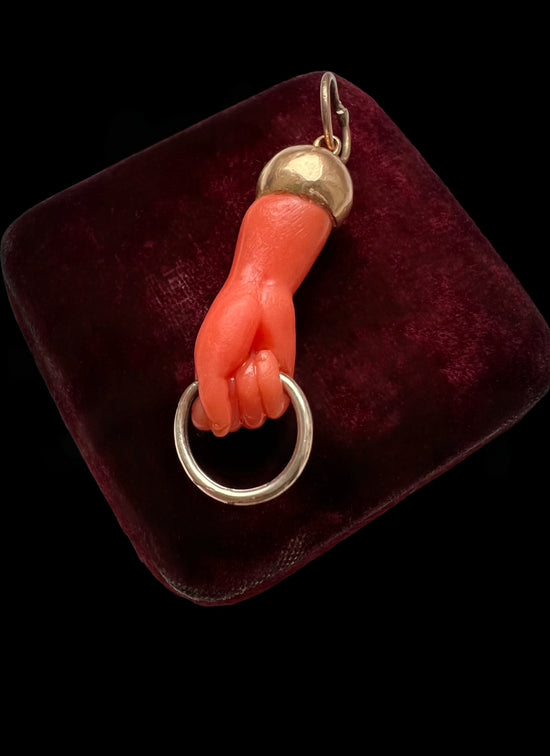 EARLY 19TH CENTURY CORAL HAND PENDANT