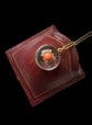 VICTORIAN ROCK CRYSTAL DOME LOCKET WITH DIAMOND & CORAL CENTRE