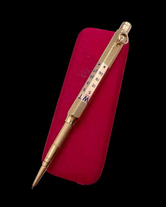 ANTIQUE PERPETUAL CALENDAR PENCIL PENDANT