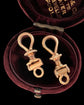 A PAIR OF 18CT GOLD CHUNKY ANTIQUE TWIST DOGCLIPS