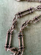 VICTORIAN SILVER TROMBONE & LOVERS KNOT ALBERT CHAIN