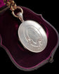 LARGE SCALE VICTORIAN SILVER ‘GARTER MOTIF’ LOCKET