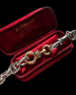 19TH CENTURY 18CT GOLD TWIST DOG CLIP