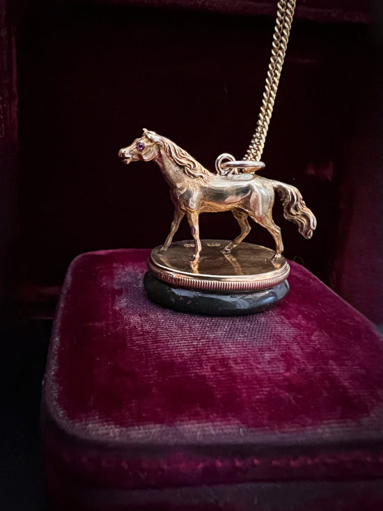 19TH CENTURY FINELY MODELLED HORSE FOB PENDANT