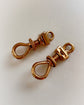 A PAIR OF ANTIQUE CHUNKY 18CT GOLD TWIST DOG CLIPS
