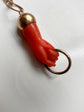 EARLY 19TH CENTURY CORAL HAND PENDANT