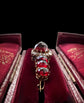 VICTORIAN DIAMOND HORSESHOE AND GARNET BROOCH