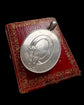 LARGE SCALE VICTORIAN SILVER ‘GARTER MOTIF’ LOCKET