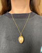 ANTIQUE SILVER GILDED EGG PENDANT