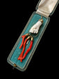 19TH CENTURY CORAL HAND WITH AMULETS