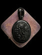 LARGE WHITBY JET ‘TULIP’ LOCKET