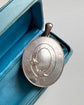 LARGE SCALE VICTORIAN SILVER ‘GARTER MOTIF’ LOCKET